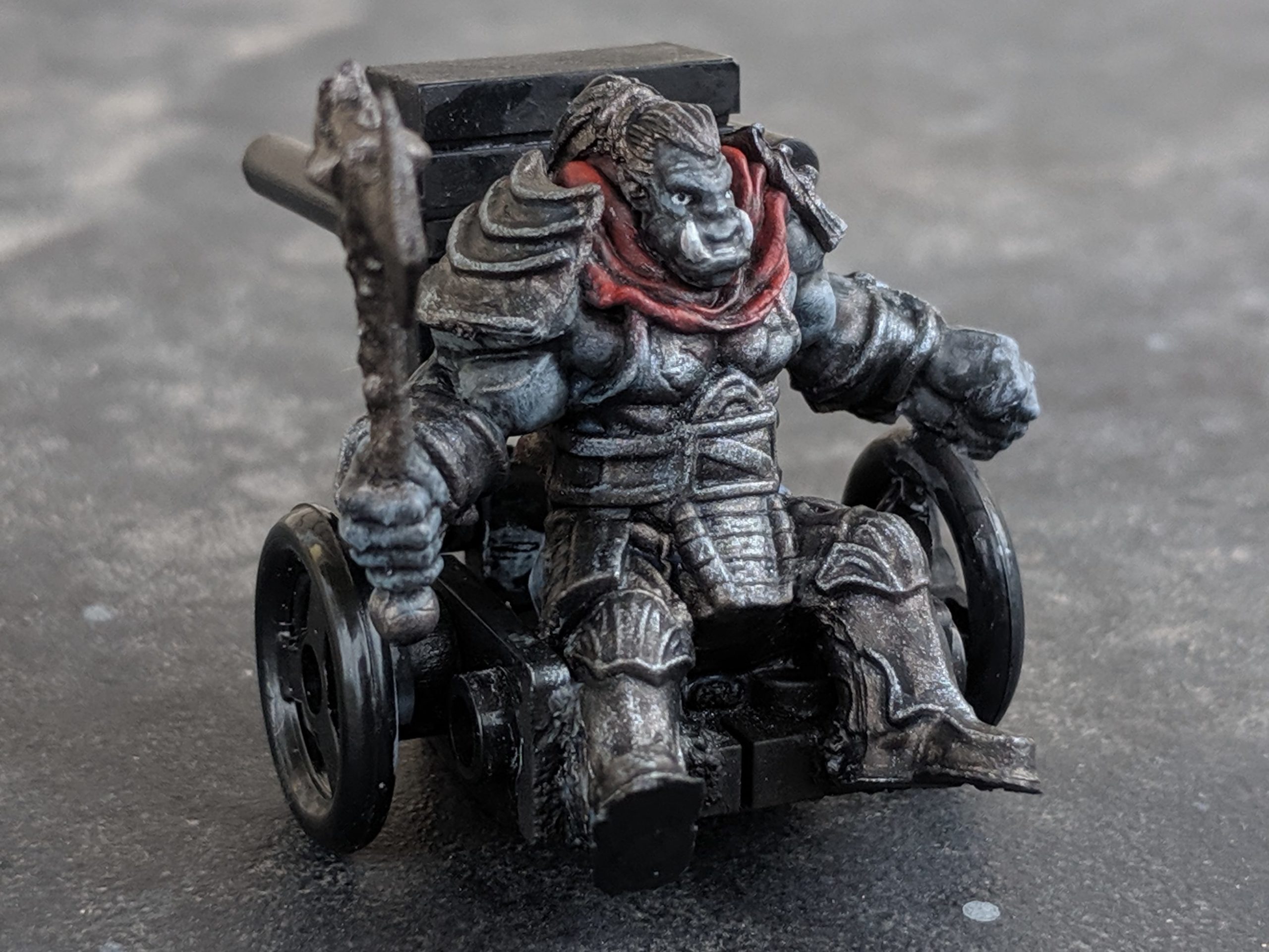 Custom D&D mini in a wheelchair.