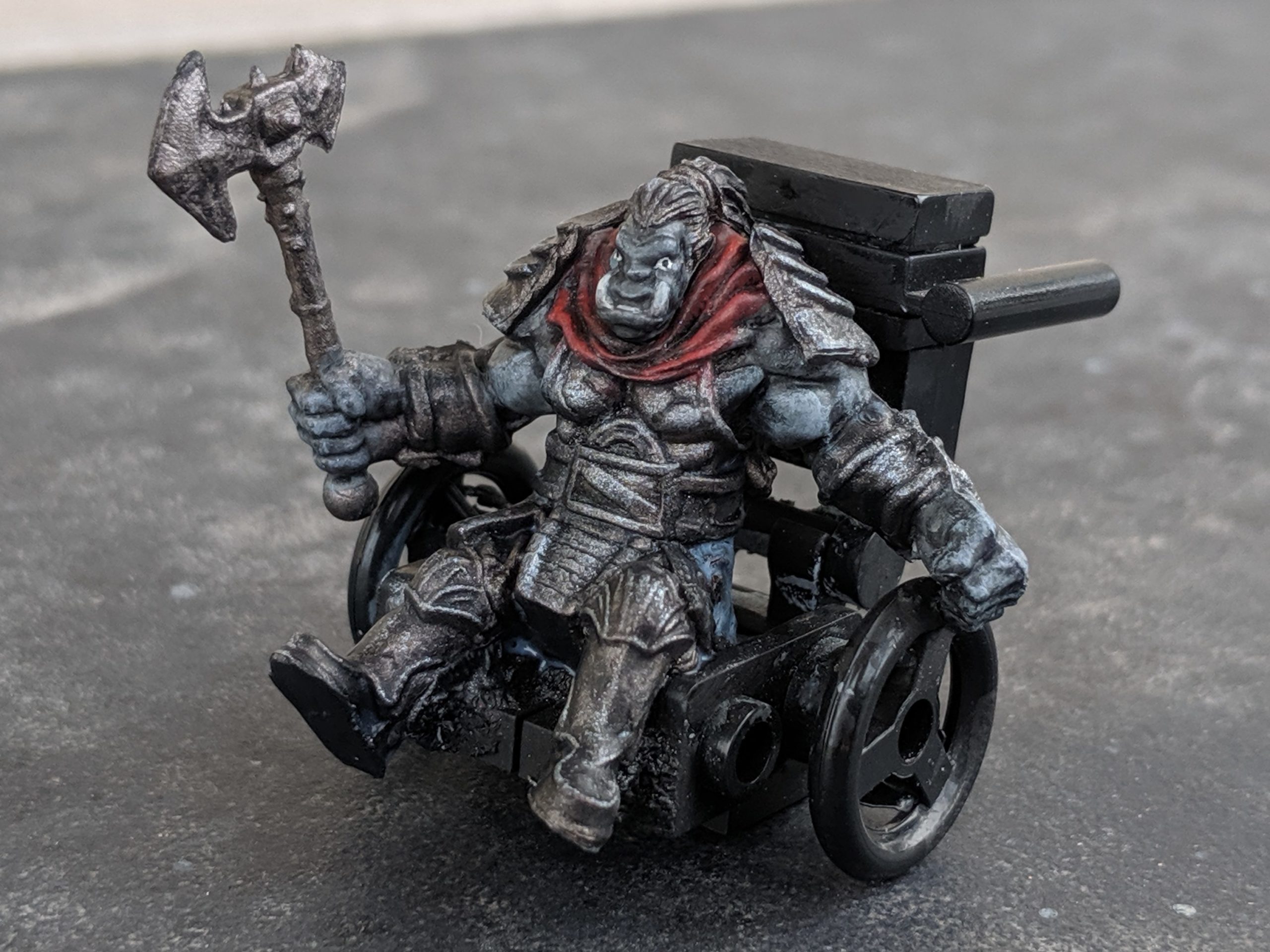 Custom D&D mini in a wheelchair.